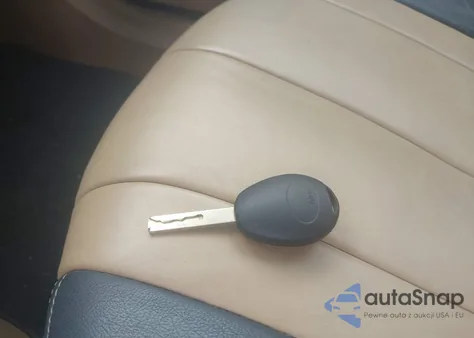 2004 Mini Cooper z USA, uszkodzony, nr VIN WMWRC33404TJ58399